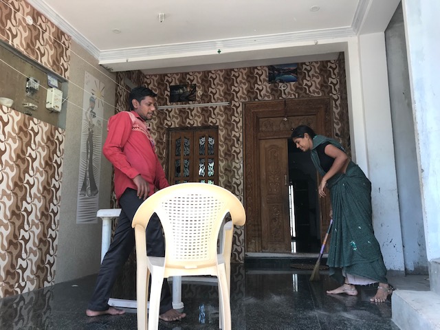 Sudha-Community residents volunteer their porch for patient registration.jpg